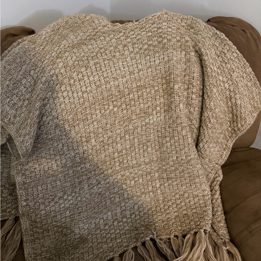 Elegant Beige Knit Poncho with Fringe